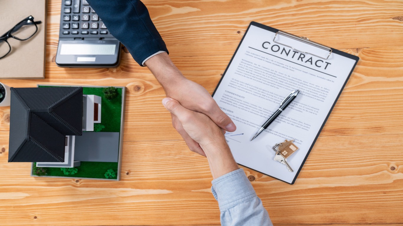 finalize-house-loan-agreement-with-top-view-handshake-entity-1